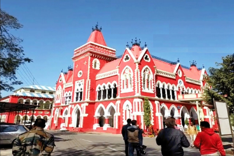 An image of a Victoria Hospital Building, which is Red in color.