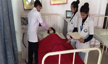 An image of students performing a regular check up on their patients.